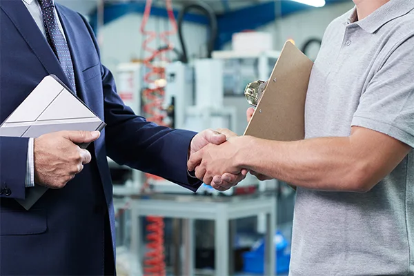 two people shaking hands