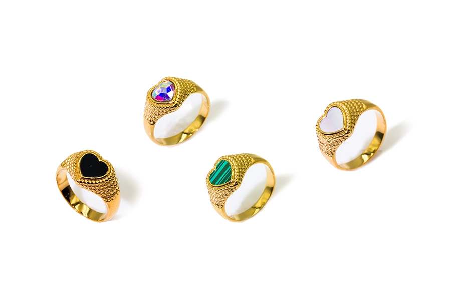 four gold plated rings