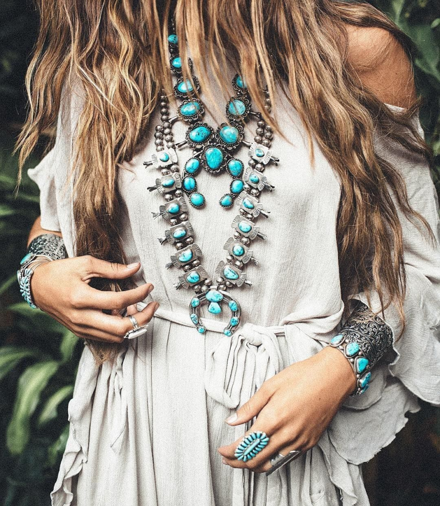 girl wearing turquoise bangles and necklaces
