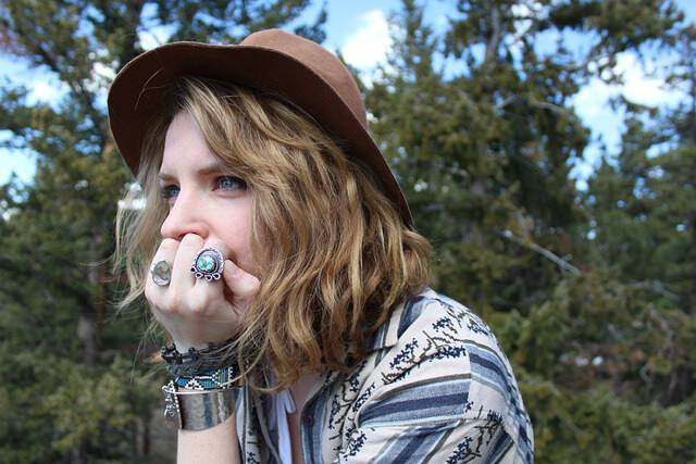 girl wearing turquoise jewelry